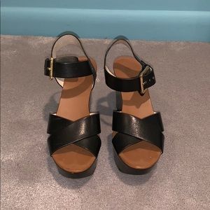 Black leather wedges